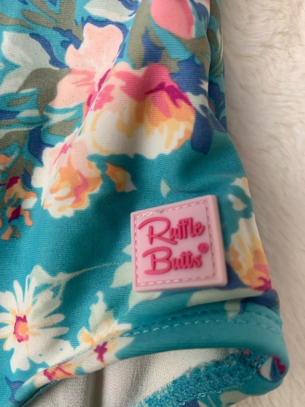 Ruffle Butts Turquoise Floral Ruffle Swimsuit - Picture 2 of 7